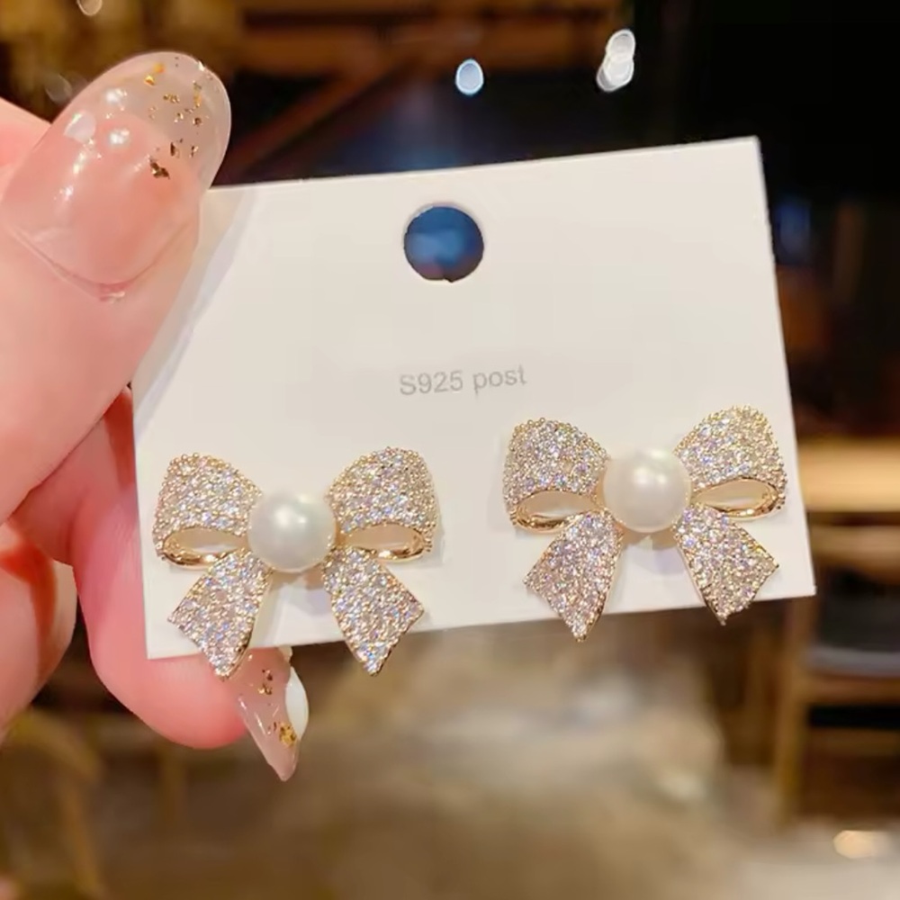 Gold and White Bow Crystal Earrings